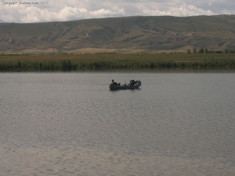 Azatbek and Ruslan at the boat. Kokuikul Lake fishing.