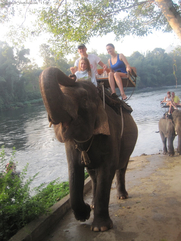 Elephant riding. The village on the river Kwai