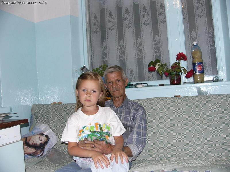 Lyuba and grandfather.