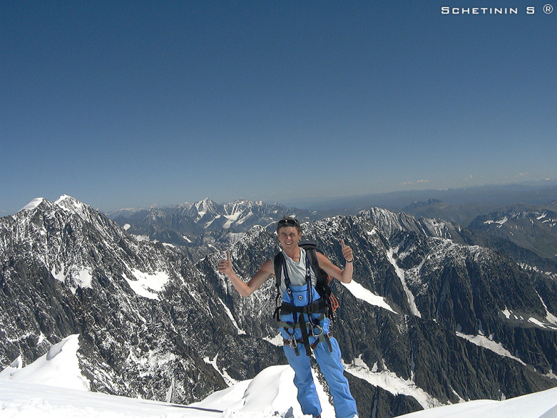 I am happy after climbing at peak Belukha.