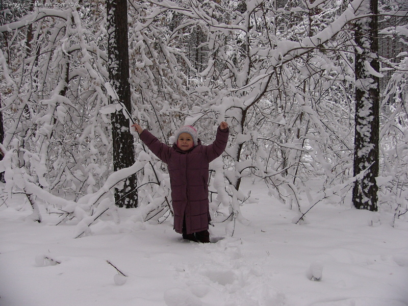 Lyuba among the trees.