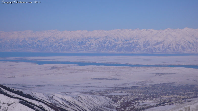 Winter Issyk-Kul Lake, Karakol town from ski route