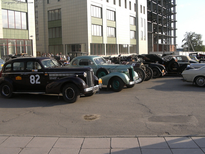 Two Buicks and other cars in the line.