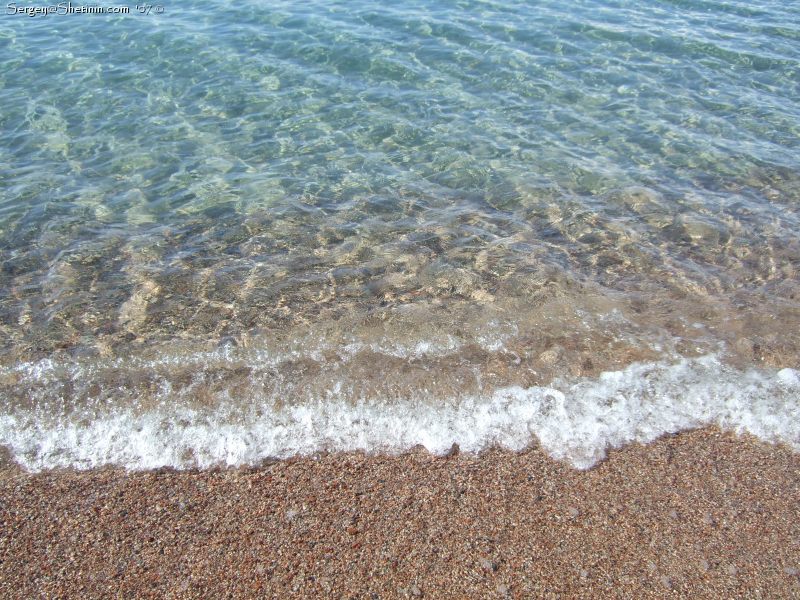 Crystal clear water of south shore of Issyk-Kul Lake.