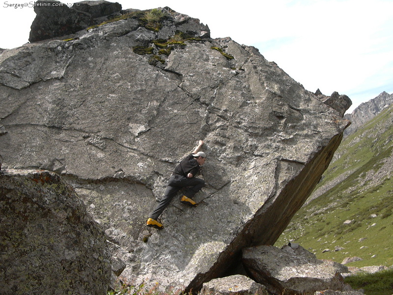 Erwin is climbing on the next rock.