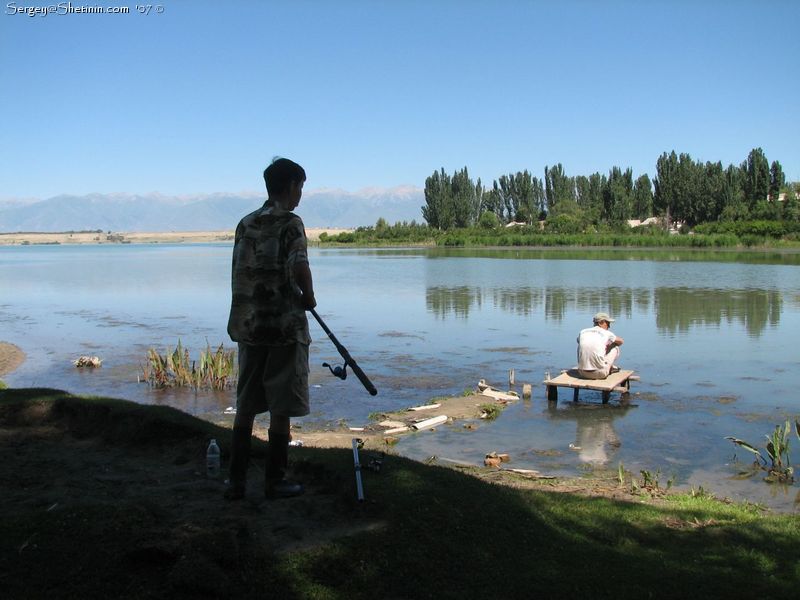Fishing in the mouth of Kara-Suu river. Issyk-Kul