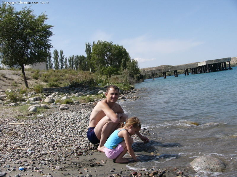 Issyk-Kul Lake shore. Testing a water.