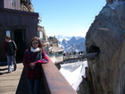 There is no place without tourists in Europe.
At photo: Zhana against a background of the entry to the tunnel which has a lift to the very top of Aiguille-du-midi peak.