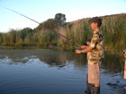 That was the day of the first meeting of my friends (Ruslan Akunov and Azatbek Dushembiev) and first attempt to chatch some fish. We went to Mikhalovka's dachas area - there is a lovely small pond, called Lake 'Krugloe' (Round). I used to successfully chatch a fish there at any time of the day 5-6 years ago. But this day we had no any success - teh lake was changed very much and became unknown for me. But gnats were happy to meet us.