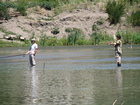 After some time we discovered this place, asked local fishermen about fishing strategy of this area (btw all of them were going home to this moment because the best biting was in the morning) and went to the confluence point of Kara-Suu river. We didn't catch some fish this day, but became refreshed and got a better mood thanks to water, breeze and sunny day. At photo: me and Ruslan, who tied a wonderful useful  float to his fishing line.