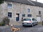 This is a house of my friend Jean-Claude (he is on the photo in the door). His car is here too - Renault Megane. The dog - 'Pasha' - is very kind and playful (his favourite game is to bring slipper thrown by somebody out).
The house is built from stones and very large. We were living on the 2nd floor.