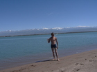 Me, Issyk-Kul Lake and two most beautiful peaks of Terskey range: Peak Karakol (5216m) amd Peak Oguz-Bashi (5168m). In 2001 I had a successful climbing on three highest peaks of this area: above mentioned peaks plus Peak Djigit. Unfortunately we couldn't reach even a bottom of Djigit peak this summer because of the bead weather conditions.