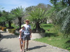 Sergey, Lyuba and cock on the photo in the park of millionyears stones. Pattaya. Thailand