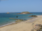The town's beach of St-Malo. We met an interesting idea to create a pool on the coast. When they have ebb time the water in the pool is left and people can swim there. If you notice at this picture - the water is between the beach and the first isle.