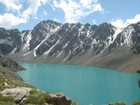 Ala-Kul Lake. The first view. When you reach altitude 3532 m above the sea level you can see the Lake Ala-Kul - this pearl of Karakol gorge. There is no fish in this lake because of cold water and high altitude, but the landscape of this area is really beautiful and more and more tourists coem here each year.