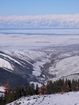 New chair lift of Karakol ski-base at the background of Issyk-Kul Lake and Karakol valley and town. It's not bored to go up with such a beautiful landscapes of Kyrgyzstan.