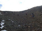 The deep scree is going down from Ala-Kul pass. You should be careful going down - the stone can go down after your step and harm other people. So everyone was going slowly observing the trail that was going like zigzag from Ala-Kul pass.