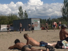 Local boys were playng football without boots but in socks. Maybe socks helped them to protect feet from the hot sand, but maybe to make kick more stronger?