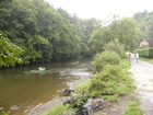 After going down from the rocks we were walking along the river where children were paddling. We also could see the fish (small troats) in the clear water of the river.