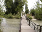 This is an old, well-known to local people, bridge over the Karakol river. This bridge was reconstructed recently, after it was almost completely broken, and now it's looking well, having a part of gibbet as a base.