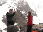 Greg is describing to Valerie some features of the route... maybe...