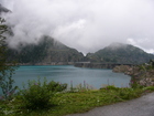 The dam from other side. The clouds are coming up from the valley below.