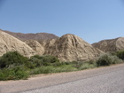 Some more interesting mountains/hills. Clay or sand is one of components of there small rocks. Near town Balykchy (former Rybachye or Rybachie)