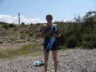 I am standing on the shore after swimming in the Lake Issyk-Kul.