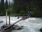 My turn to cross the river. The logs were slippery indeed.