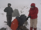 We've reached the place where we could see the last point of our climbing for today - the pass Terimtor 4000m. We had a short stop to have some rest and wait for other group members - moreover we've covered by clouds and snow. At photo: Christine at the left and Valerie.