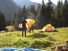 Our last camp in Karakol valley was not far from valley's exit. We set the tents in Zangi valley. The water here is considered to be the cleanest in this area. At photo: Greg and Erwin Are shaking off the tent in the morning.