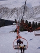 View of route, chairs and cabim on 2650m from chair lift on the way to 2750m where you can start your skiing or continue your elevation to 3040m with simple lift.