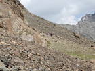 Tre trail is going from the lake Ala-Kul to the pass by the left slope in the stones and rocks.